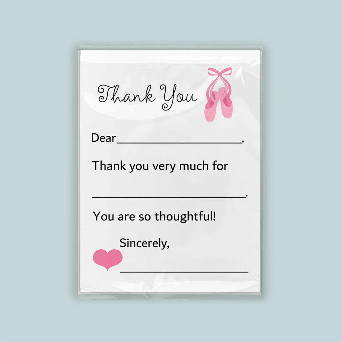 The image is a white thank you card with a pink ballet shoe graphic and a heart symbol. The card has a blank space for a recipient&