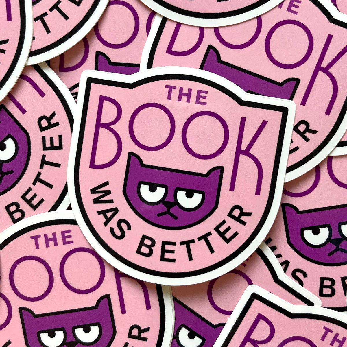 Stickers with a purple cat illustration and text &