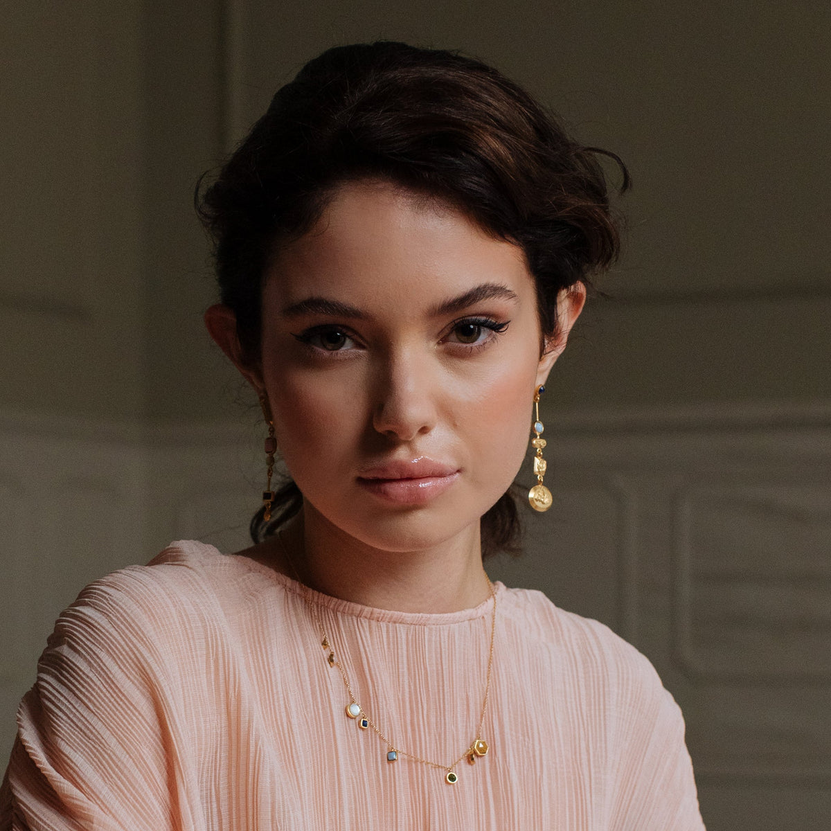 artisan handmade necklace and earrings, on model