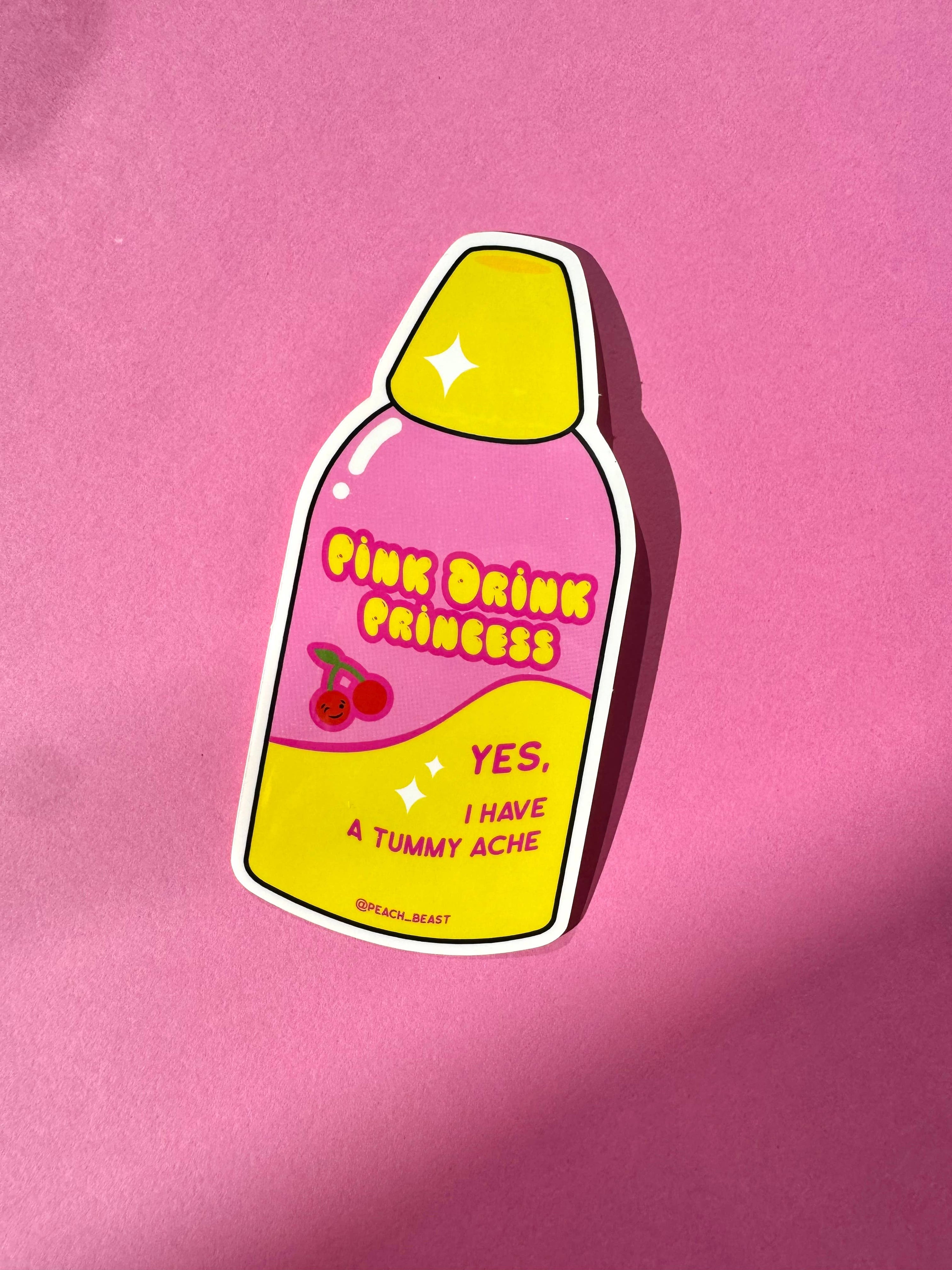 Sticker of a pink drink labeled &