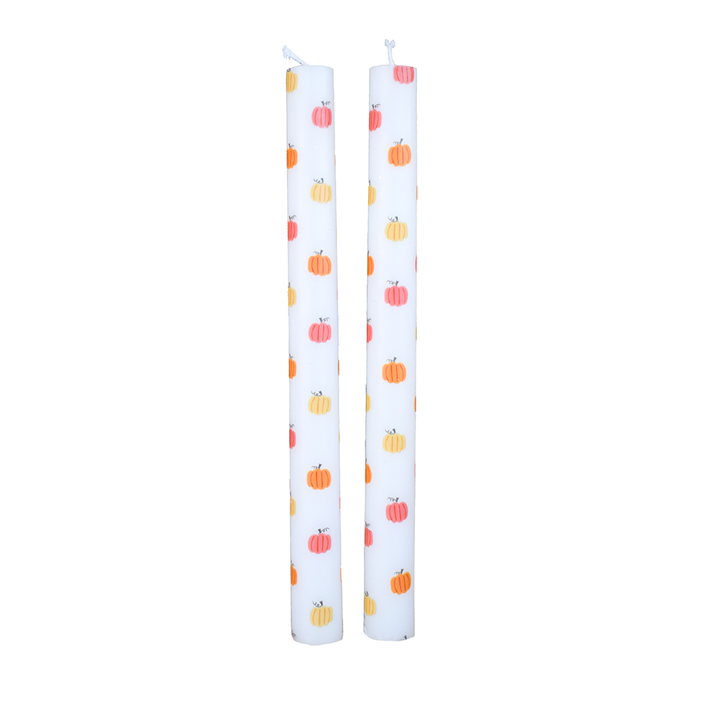Trick or Treat Street pumpkin taper candle set, ivory with coral and gold accents.