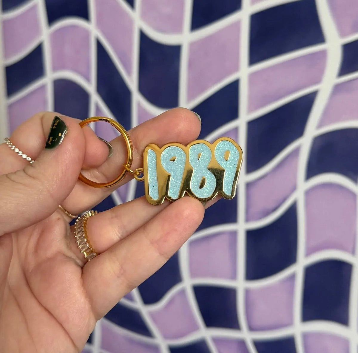 1989 blue glitter enamel keychain — hand lettered light blue glitter enamel keychain set in gold toned metal, 1.5 in, by MangoIllustrated