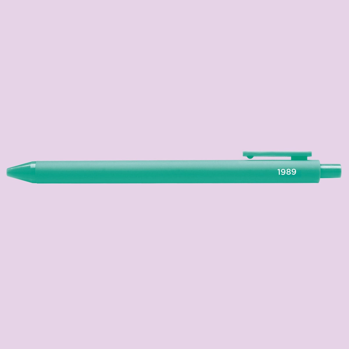 1989 jotter pen flat lay — teal jotter gel pen stationery gift by indie artist MangoIllustrated