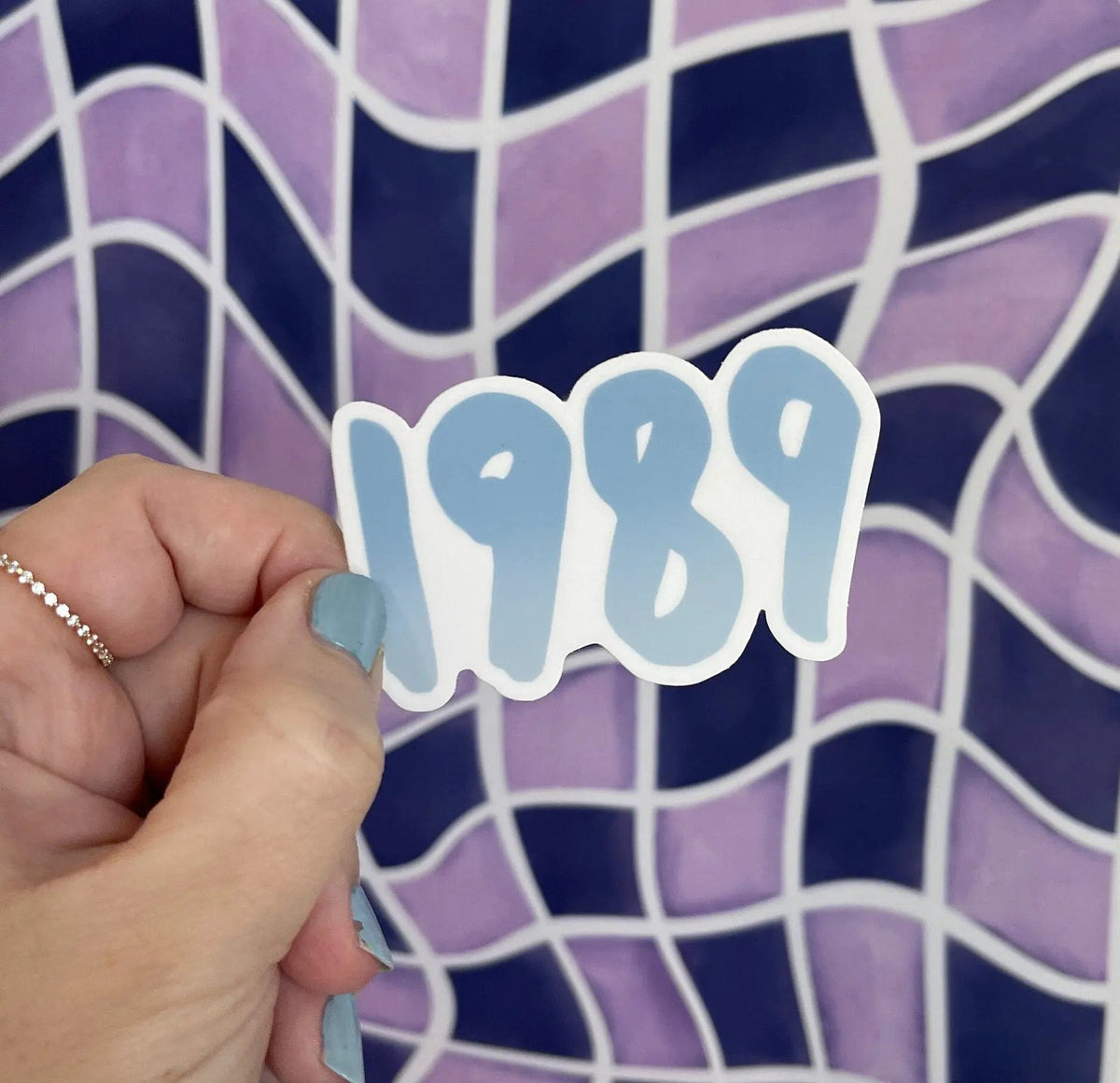 1989 sticker - blue — the year 1989 hand lettered in blue with a deep to pale gradient, by MangoIllustrated