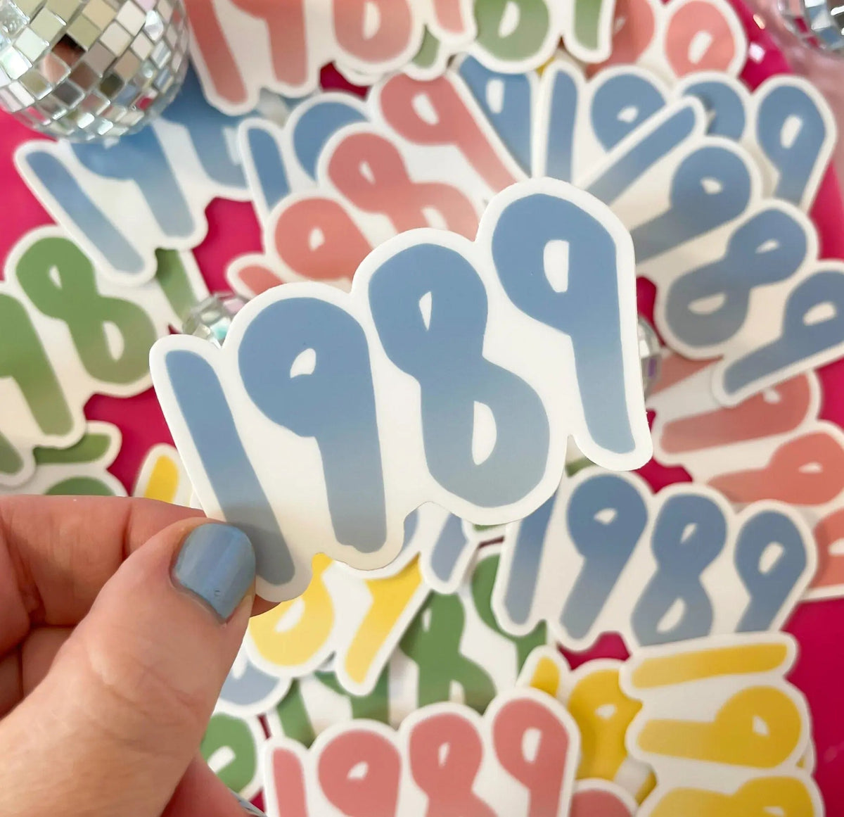 1989 sticker - blue flat lay — blue gradient hand lettered year vinyl decal by indie artist MangoIllustrated
