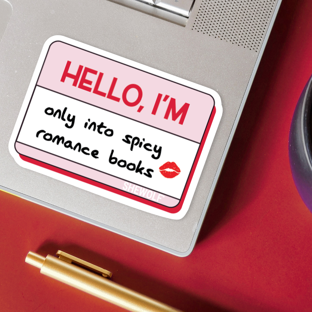 Sticker on a laptop with text &