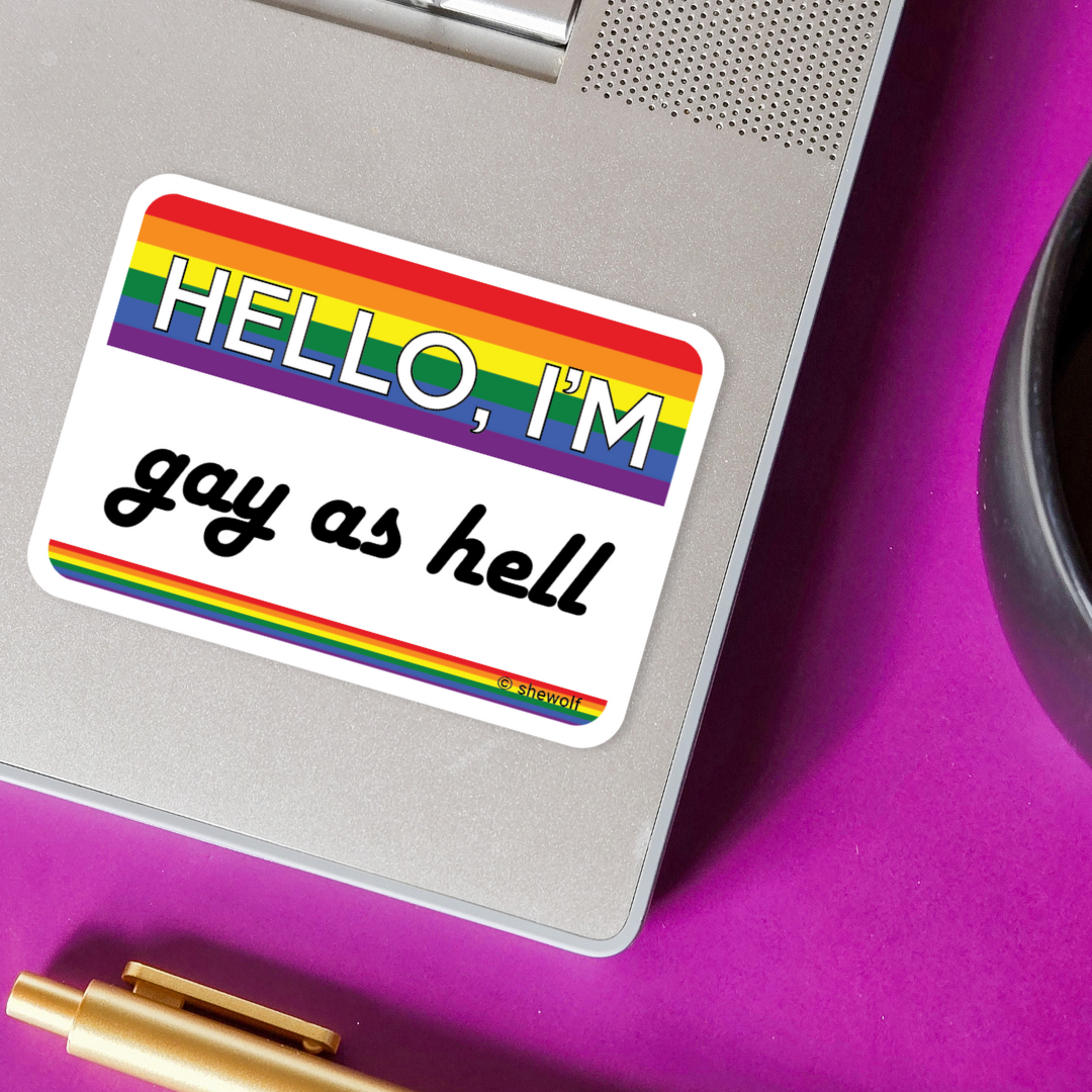Sticker with rainbow border and text &