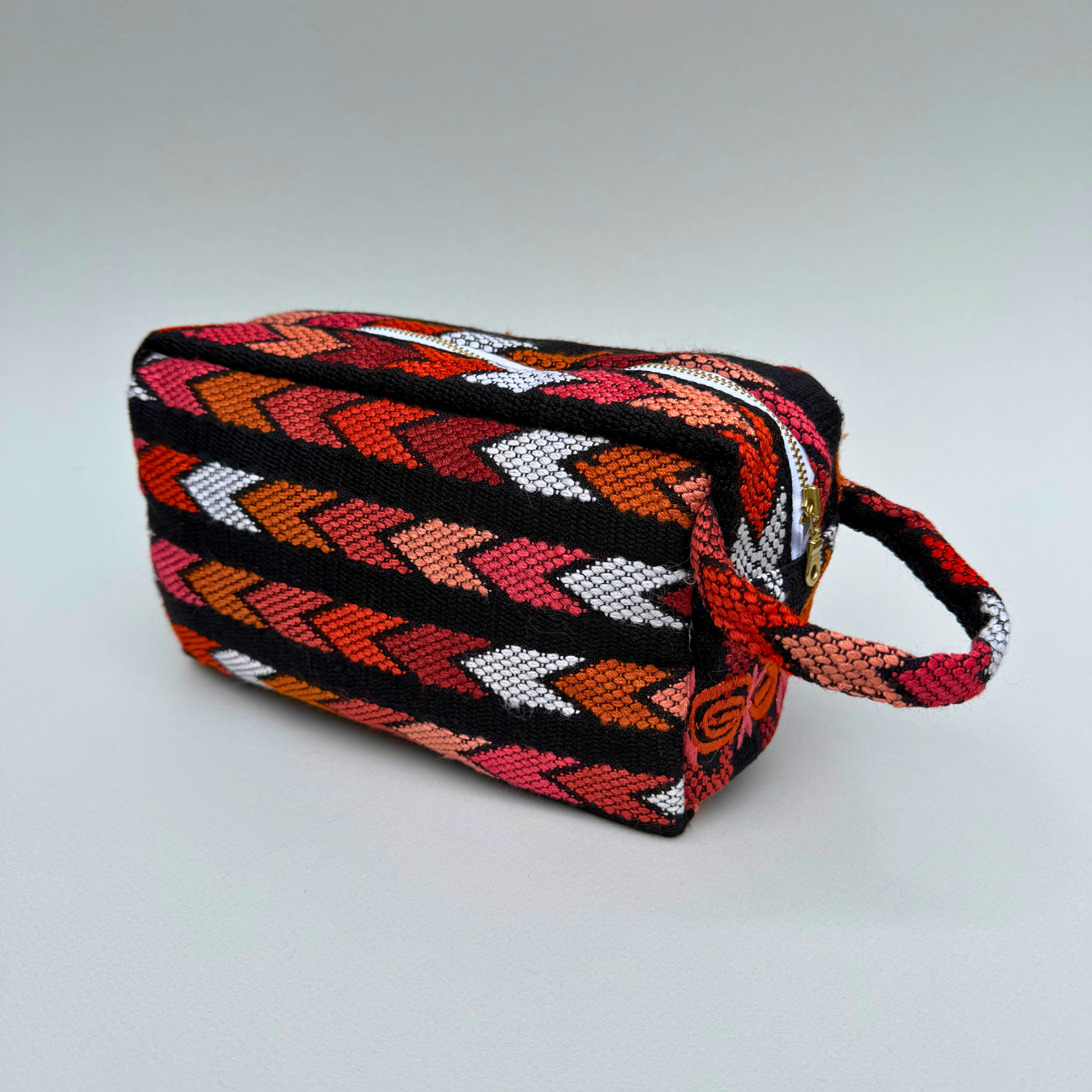 Handwoven (and Spill Proof) Cosmetic Travel Bag