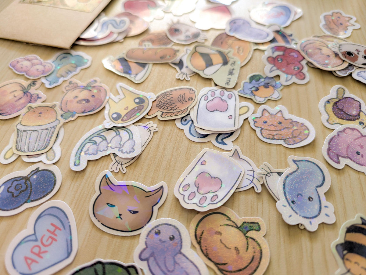 Collection of colorful stickers on a wooden surface