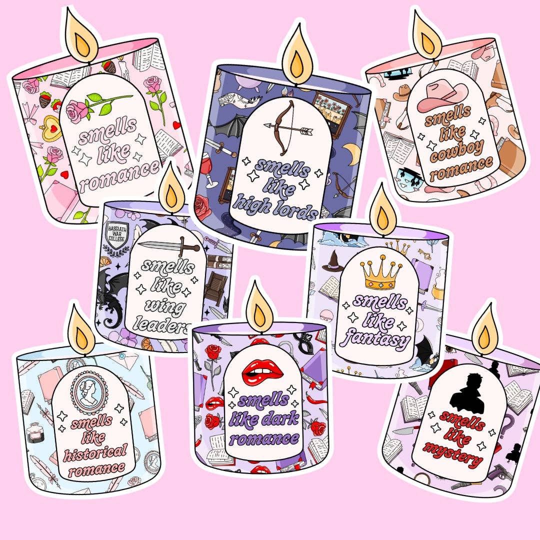 Set of candles with romantic-themed labels on a pink background
