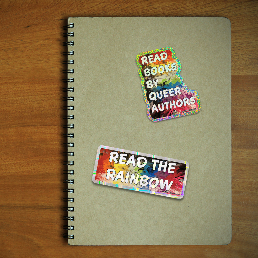 Notebook with stickers on a wooden surface
