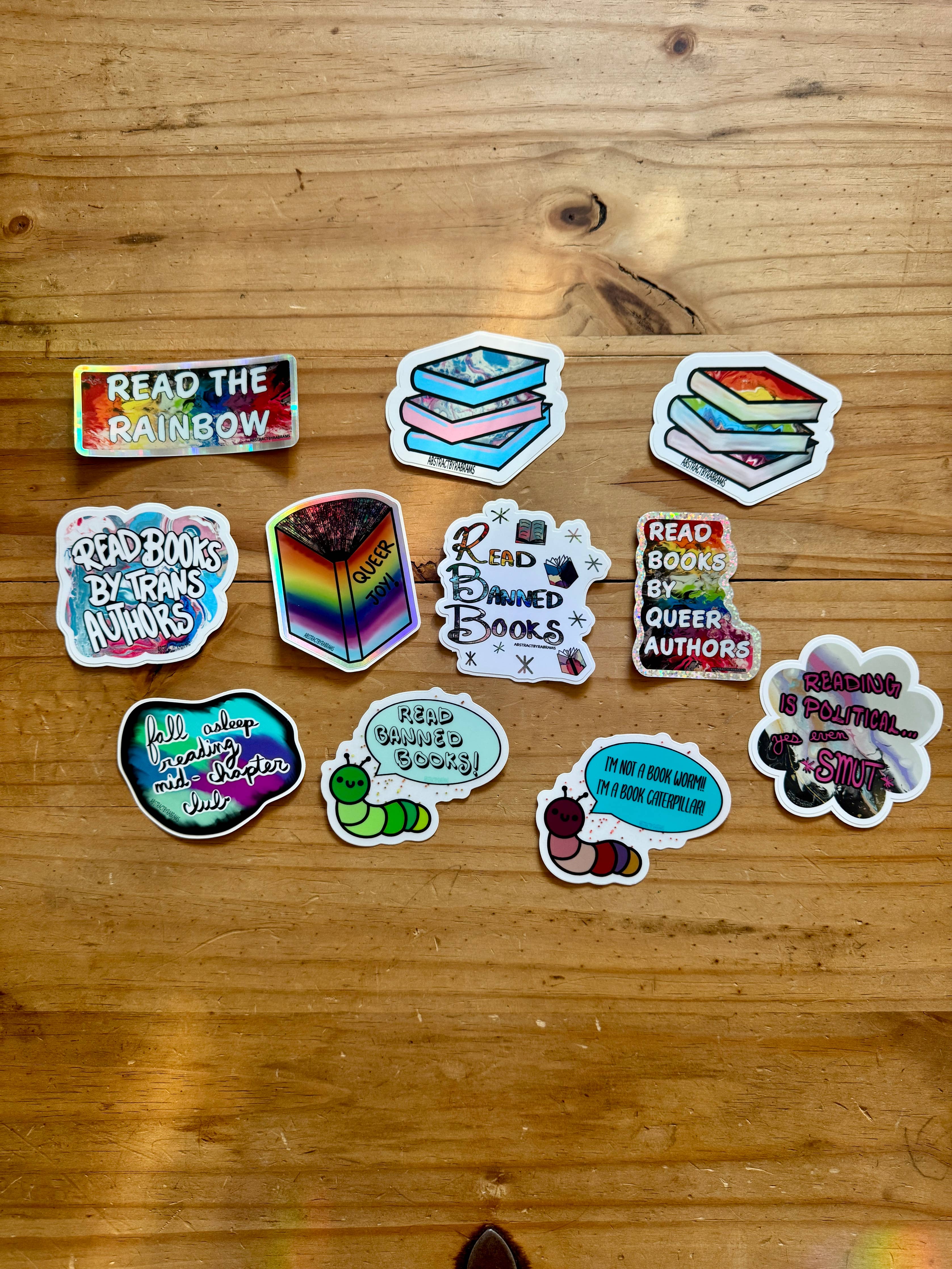 Collection of colorful stickers on a wooden surface