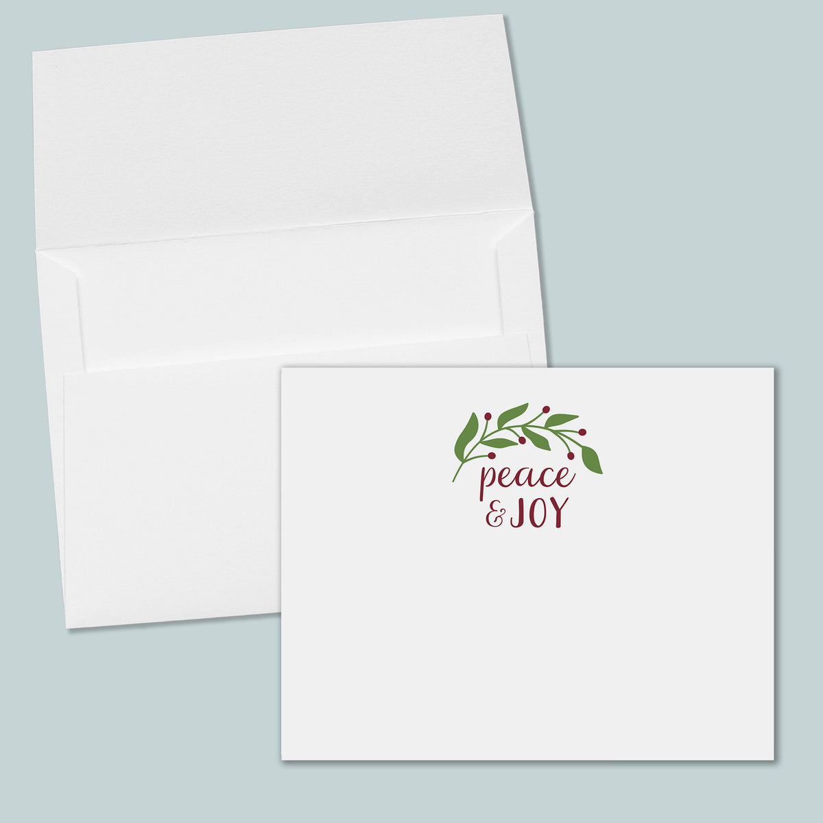 an open white envelope with a printed message on it, and the envelope is placed against a light blue background.