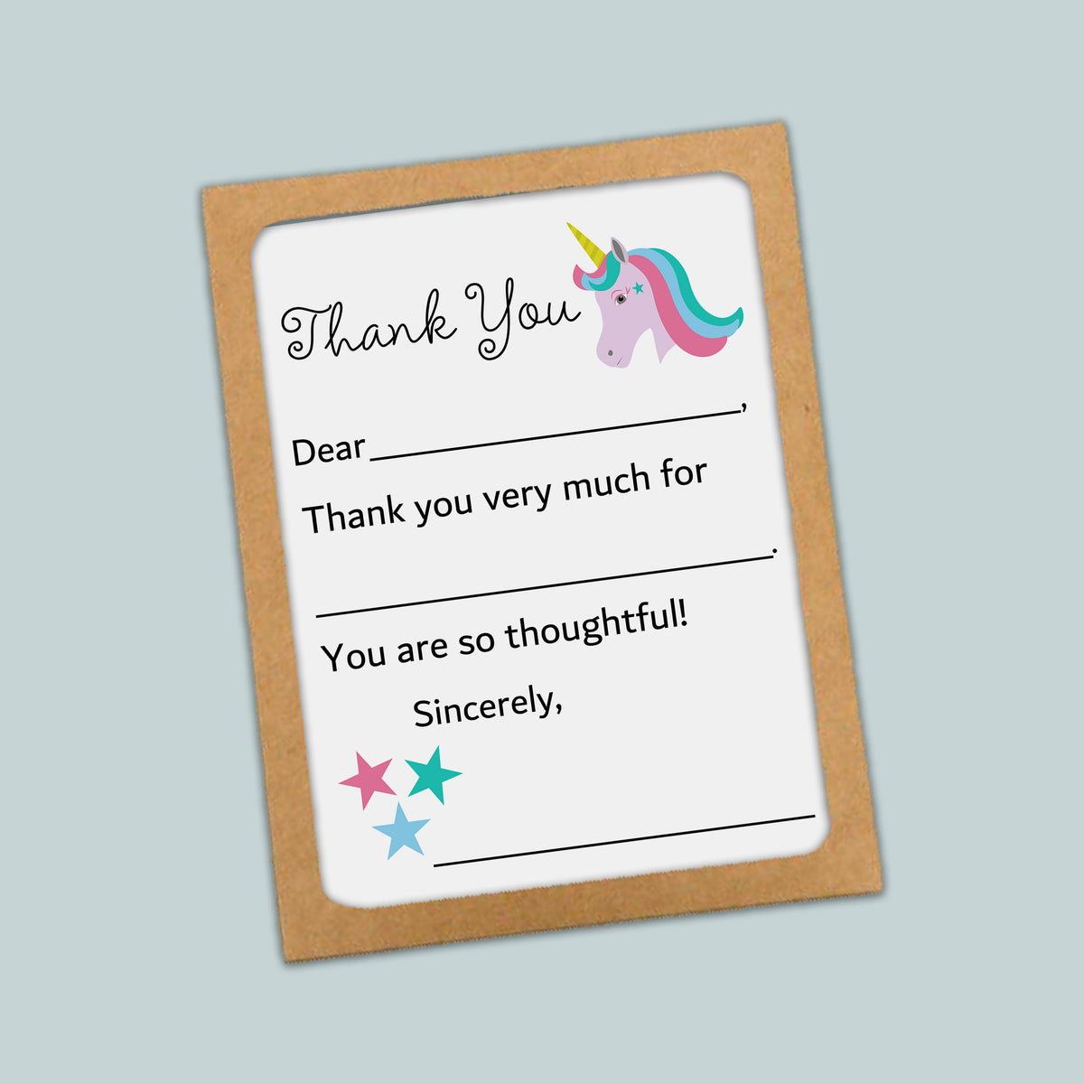 The image is a framed thank you card with a unicorn illustration and stars. The card has a blank space for a message and a blank space for a recipient&