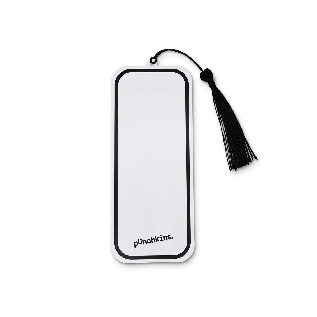 White rectangular object with black tassel and &