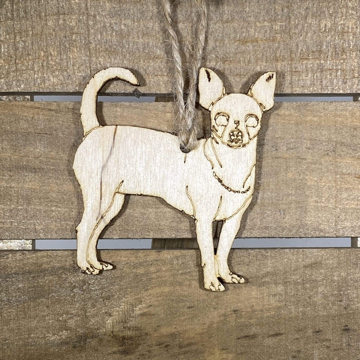 Hand-painted wooden chihuahua Christmas ornament featuring a cute small dog design with perky ears and expressive face, festive holiday decor for dog lovers and chihuahua enthusiasts by Cate’s Concepts