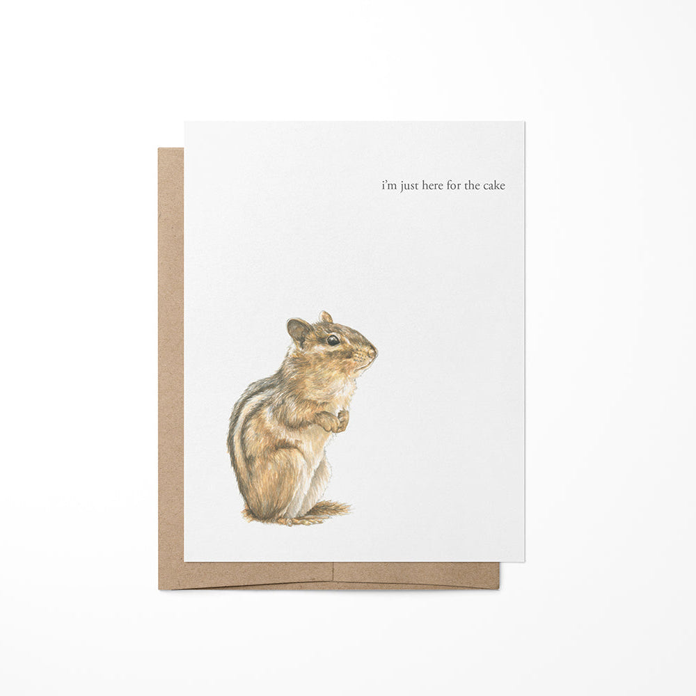 A greeting card featuring a watercolor painting of a chipmunk on the front, with a kraft envelope.