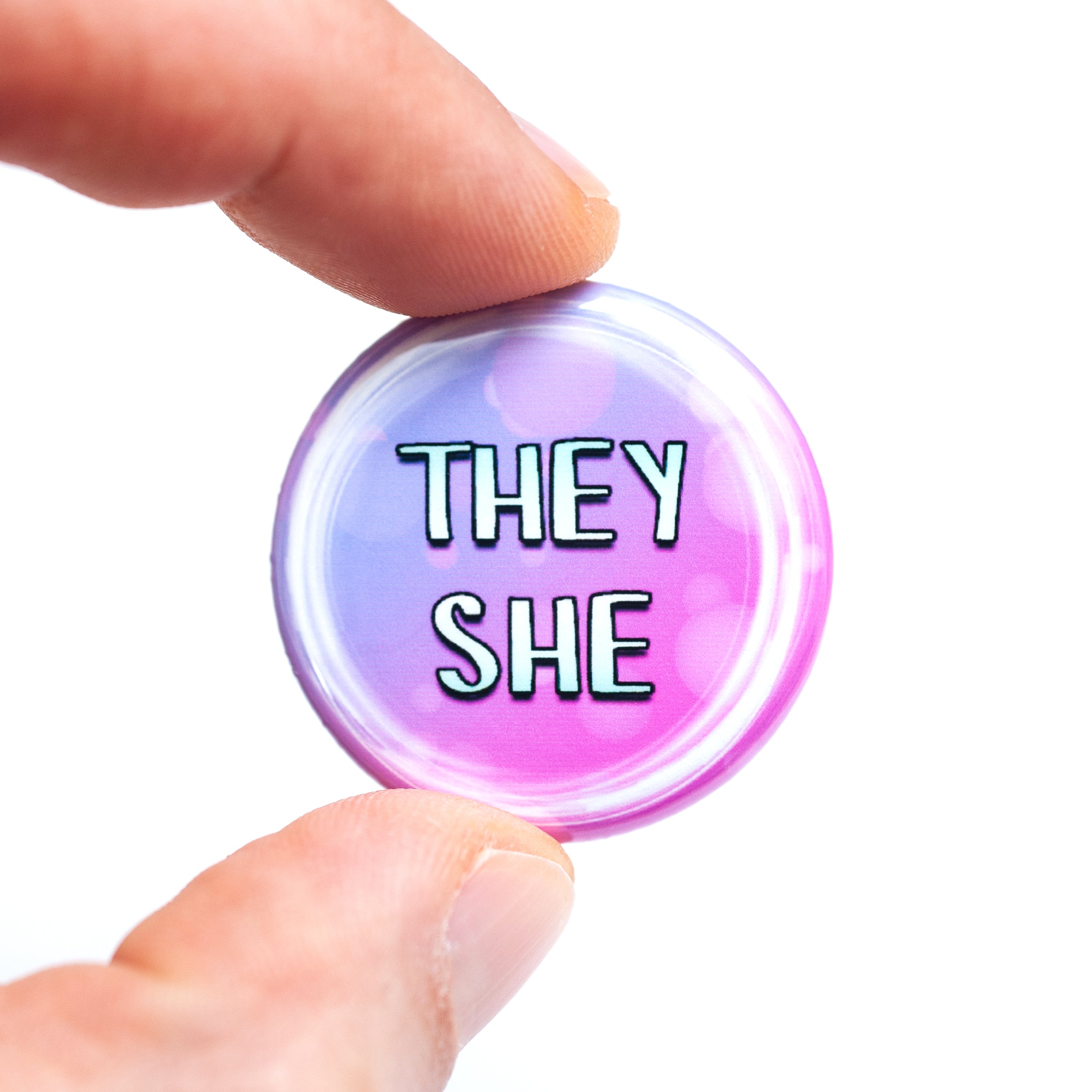 They/she pronoun buttons