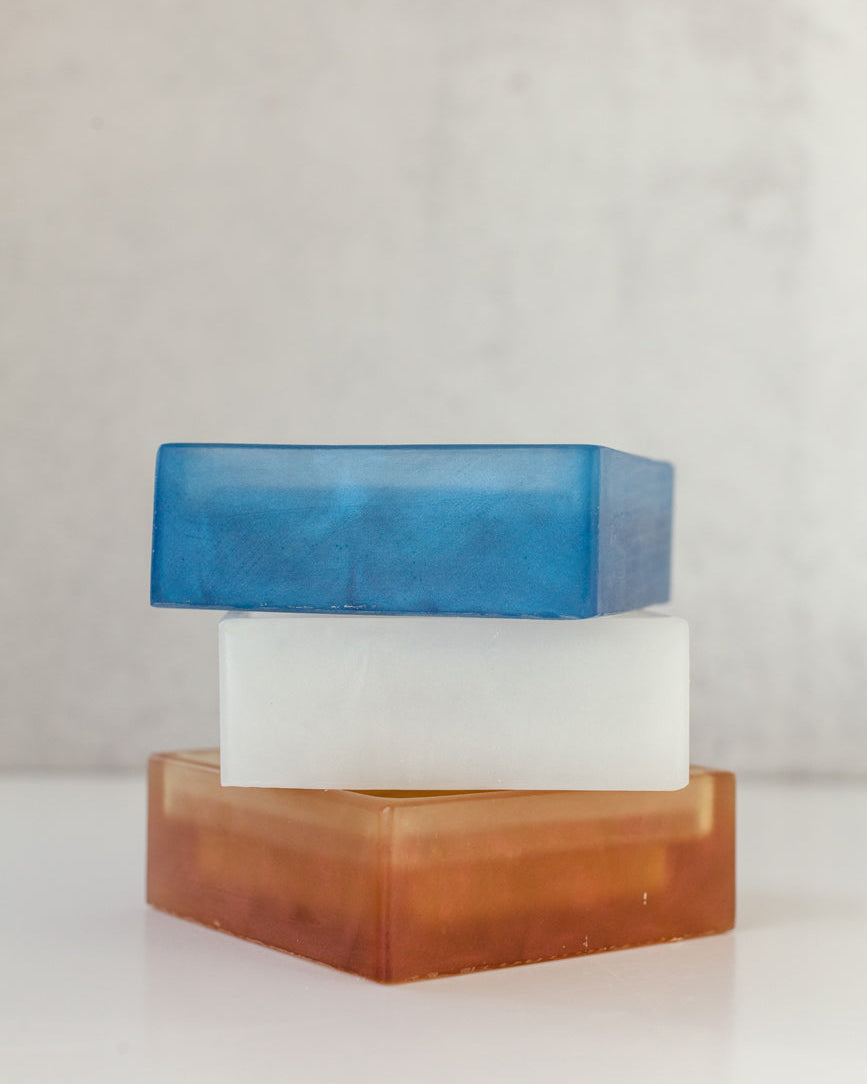 Blue, white and terracotta dishwashing soap dishes