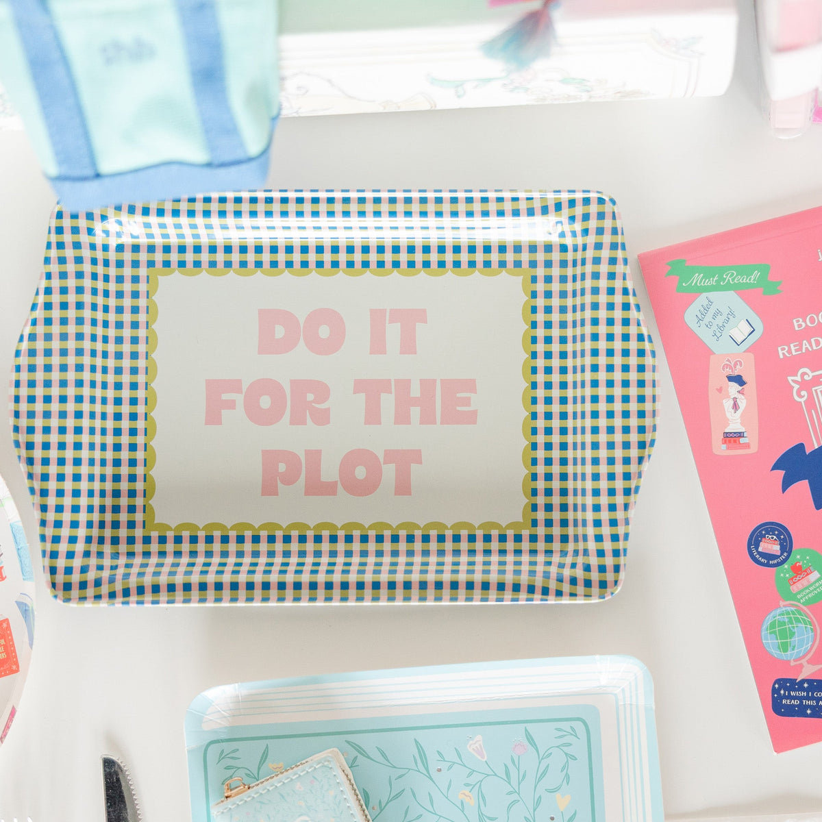 Do It For The Plot trinket tray with bookish accessories and jewelry displayed in styled setting, Jollity & Co.