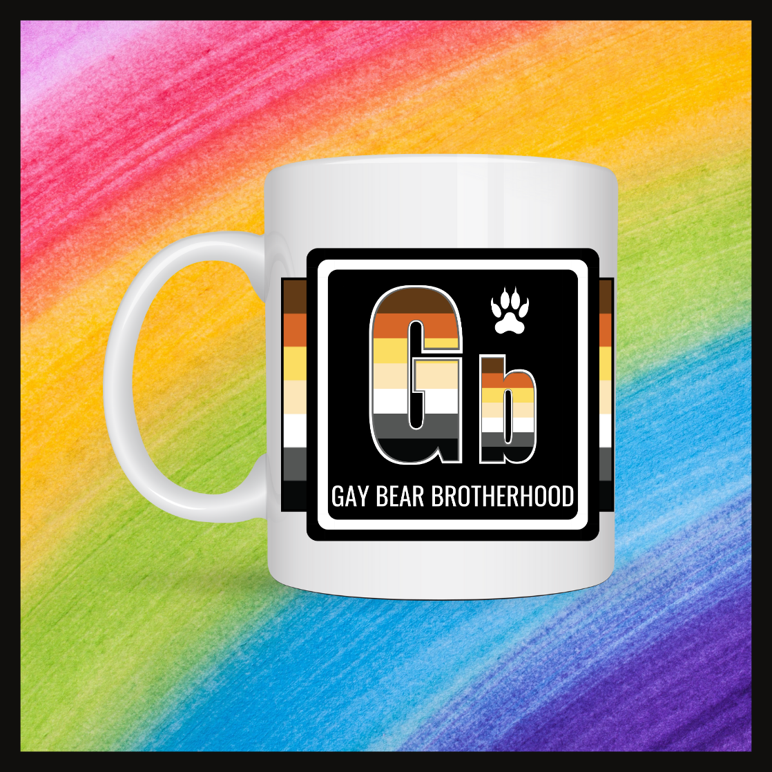 White mug with a 2 inch square containing the element’s symbol (Gb and name (Gay Bear Brotherhood). Symbol is made with the colors of that element’s flag in a black square with the element’s flag behind the square. Behind the mug is a rainbow background.