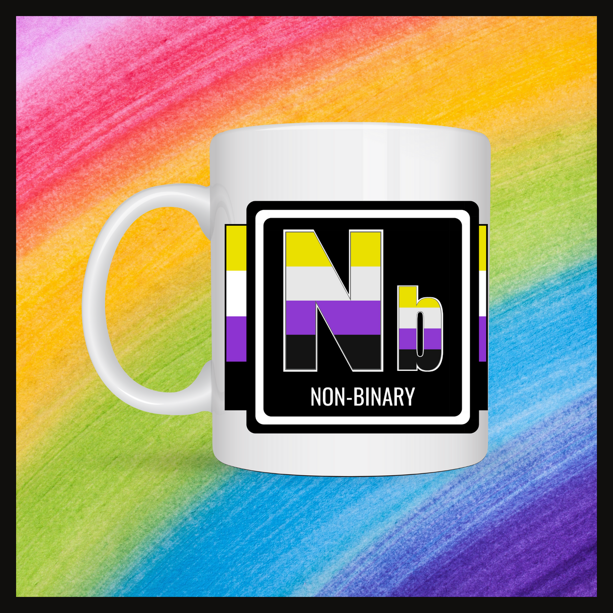 White mug with a 3 inch square containing the element’s symbol (Nb) and name (Non-binary). Symbol is made with the colors of that element’s flag in a black square with the element’s flag behind the square. Behind the mug is a rainbow background.