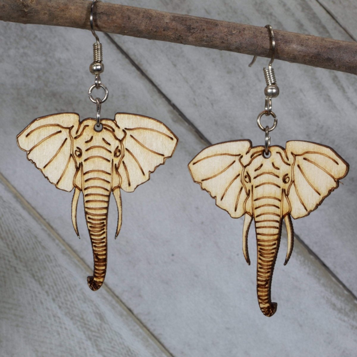 Hand-painted wooden elephant head dangle earrings with detailed wildlife design and hypoallergenic sterling silver hooks, lightweight elephant statement jewelry earrings for animal lovers and boho safari style
