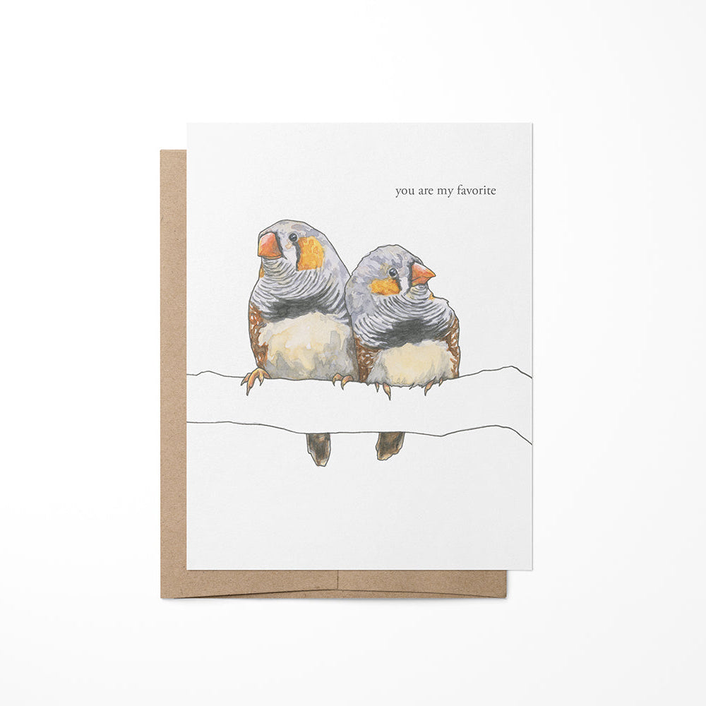A greeting card featuring a painting of two finch birds on a brach on a white background that says you are my favorite, with a Kraft envelope.