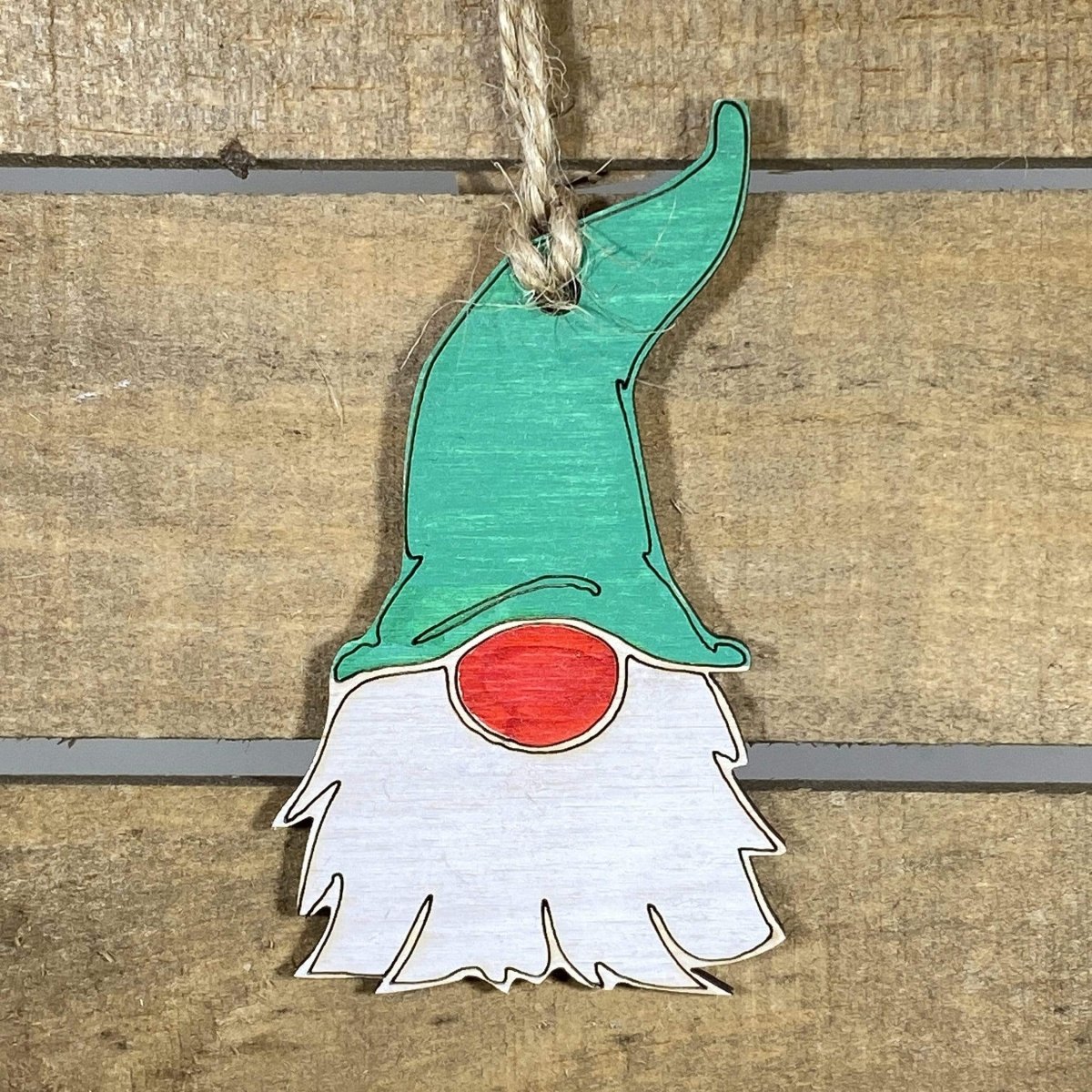 Hand-painted wooden garden gnome Christmas ornament featuring a whimsical gnome with pointed hat and playful details, festive holiday decor for garden lovers and fantasy enthusiasts by Cate’s Concepts