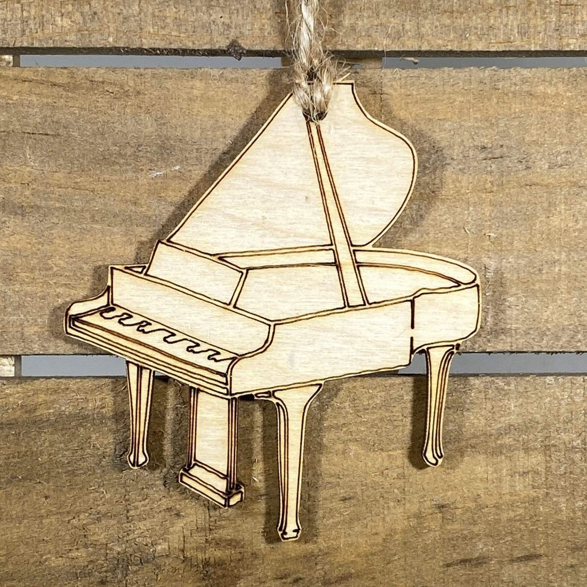 Hand-painted wooden grand piano Christmas ornament featuring a classic black piano design with detailed keys and elegant shape, festive holiday decor for musicians and music lovers by Cate’s Concepts