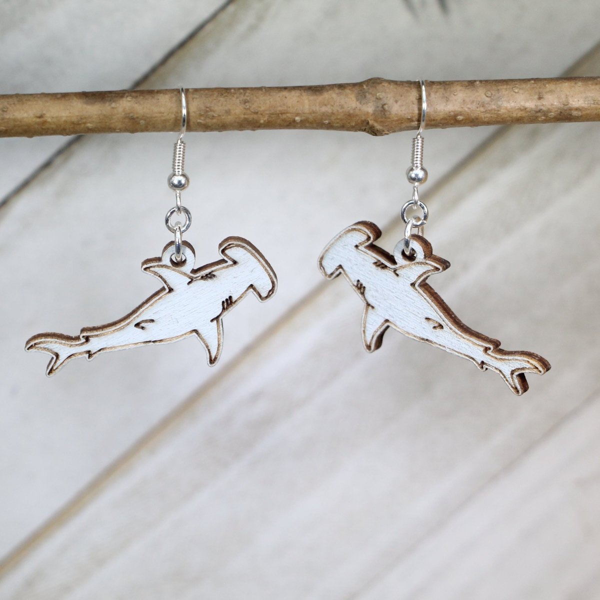 Hand-painted wooden hammerhead shark dangle earrings with ocean sea life design and hypoallergenic sterling silver hooks, marine wildlife statement jewelry for shark lovers and beach fans