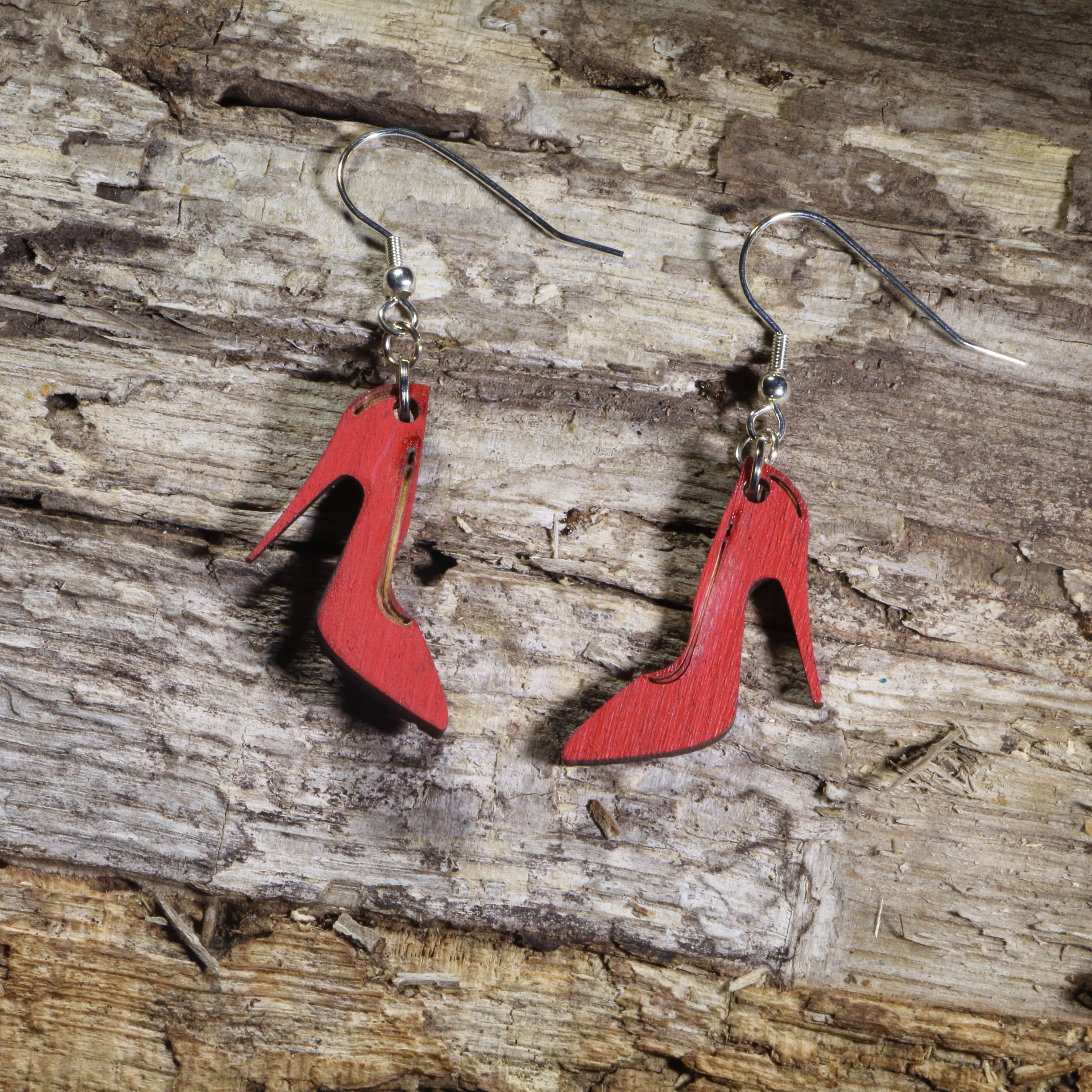 Hand-painted red high heel wooden dangle earrings on hypoallergenic .925 sterling silver hooks. Lightweight fashion jewelry for shoe lovers, fashion enthusiasts, boutique style, and anyone who loves bold statement accessories.