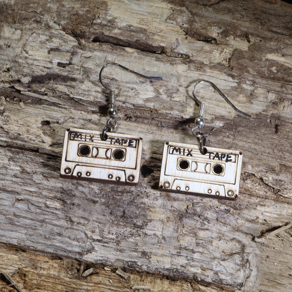 Hand-painted wooden vintage cassette tape dangle earrings featuring a classic mix tape design on hypoallergenic .925 sterling silver hooks. Lightweight retro music jewelry for 80s and 90s nostalgia lovers, music fans, cassette collectors, DJs, and vintage accessory enthusiasts.