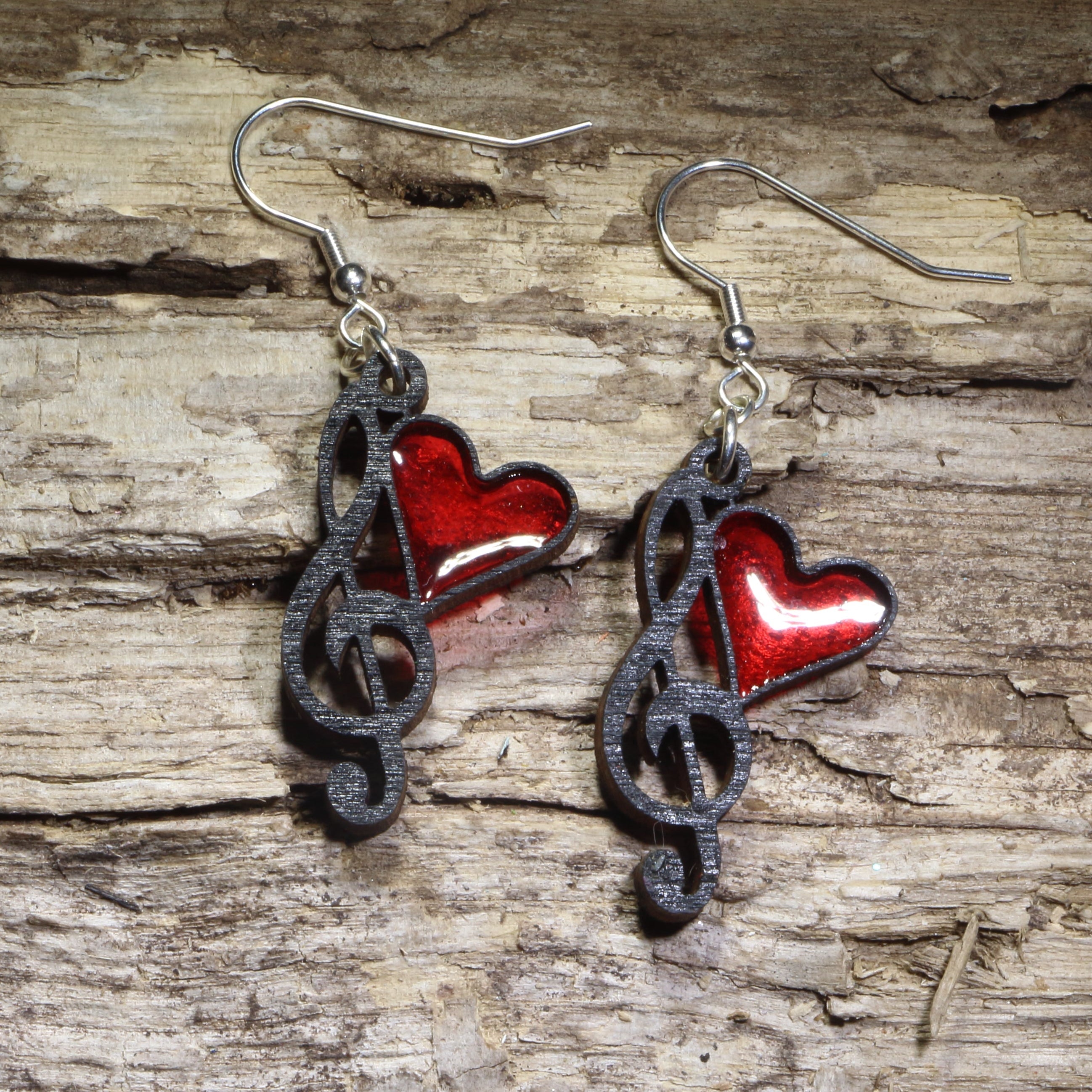 Handmade treble clef and Music Heart Resign Earrings Wooden | Treble Clef Jewelry featuring a glossy red resin heart accent on lightweight laser-cut wood with hypoallergenic .925 sterling silver hooks. Perfect music teacher earrings, choir gifts, band director jewelry, musician accessories, and Valentine&