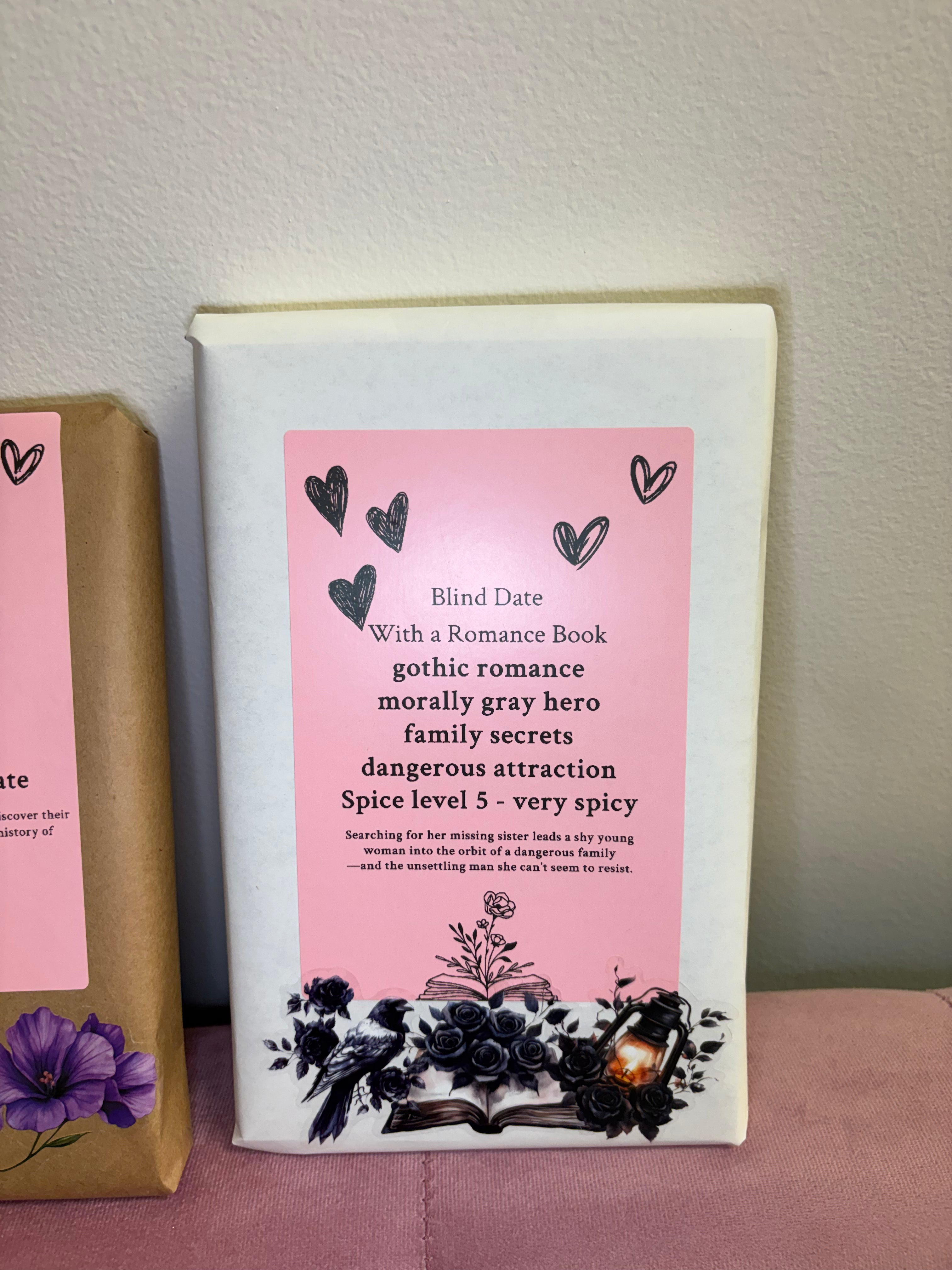 Book with a pink cover and text on a white background