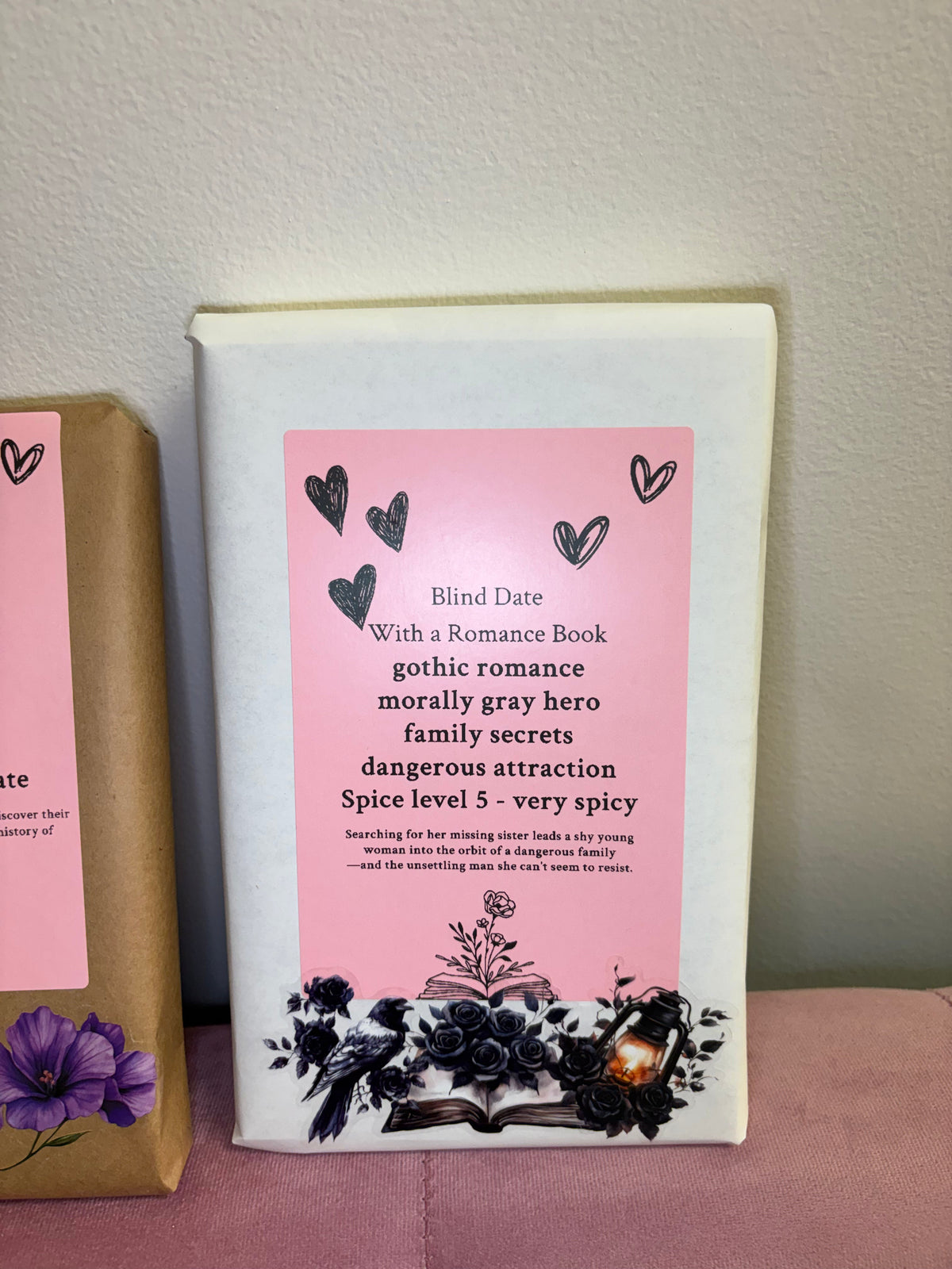 Book with a pink cover and text on a white background
