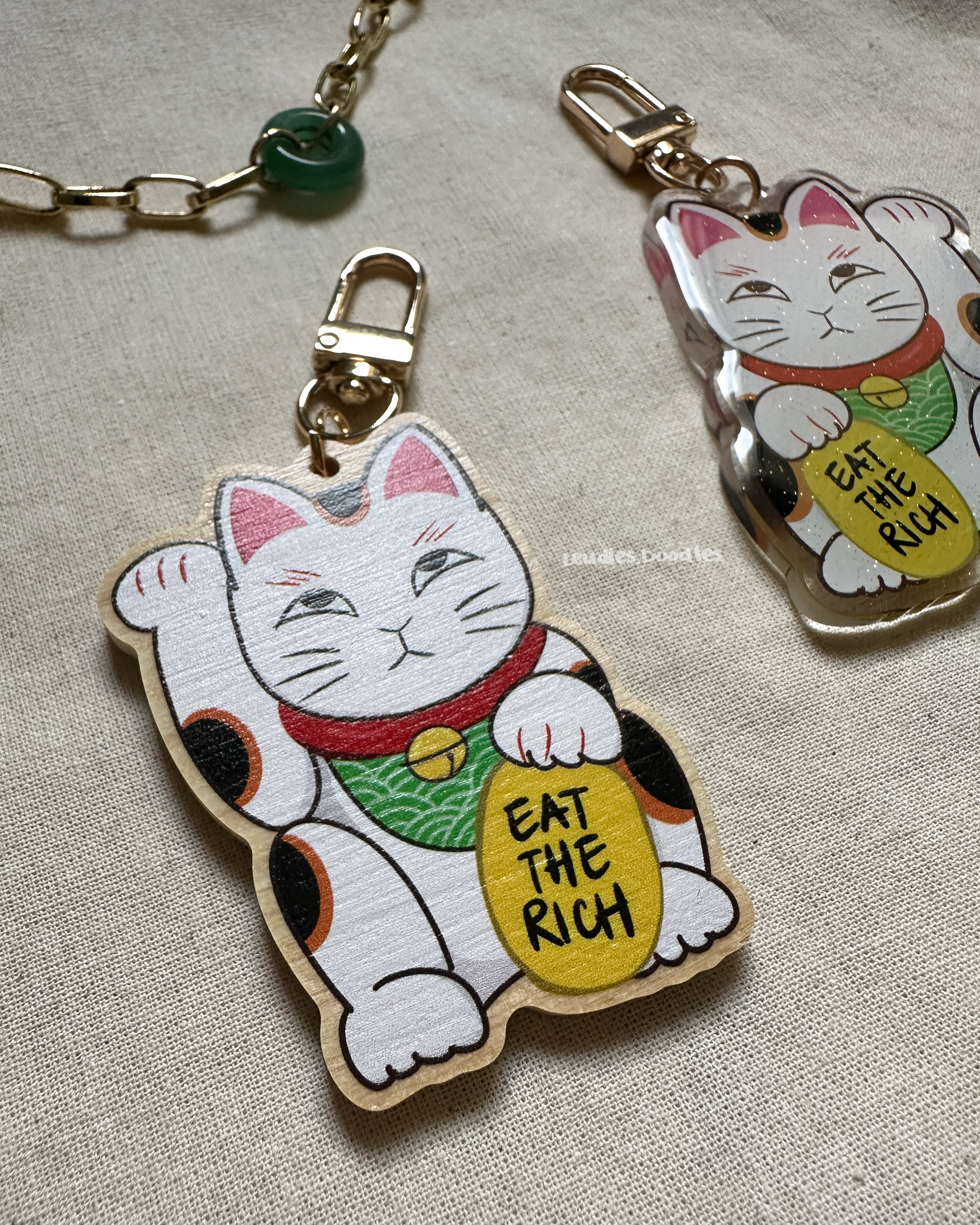 Eat The Rich Lucky Cat Wooden and Acrylic Keychains