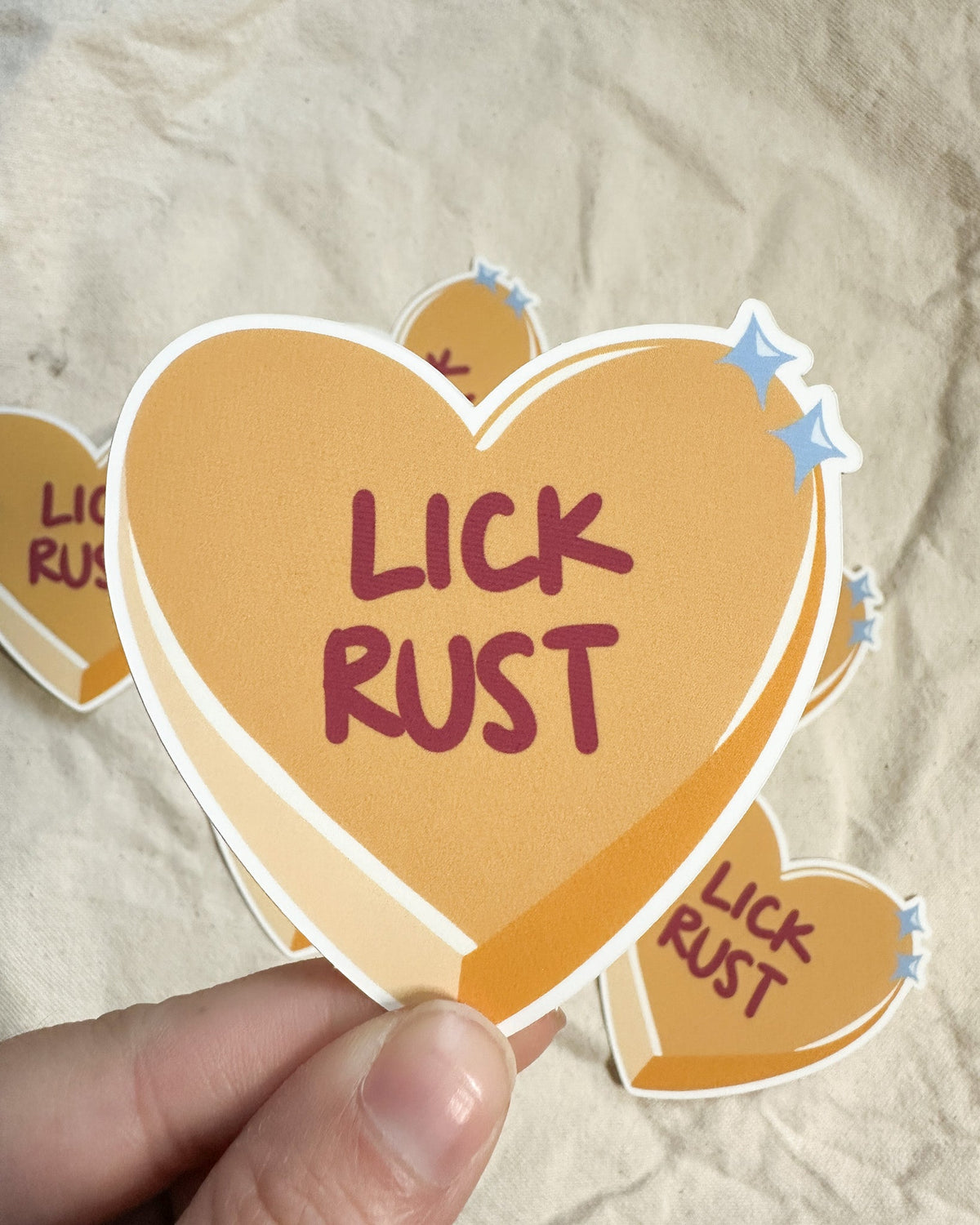 "Lick Rust" Conversation Heart Sticker (Matte)