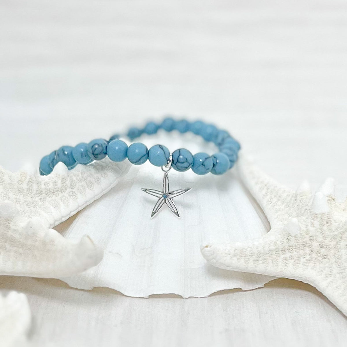 sea bright sea star turquoise stretch bracelet gold
