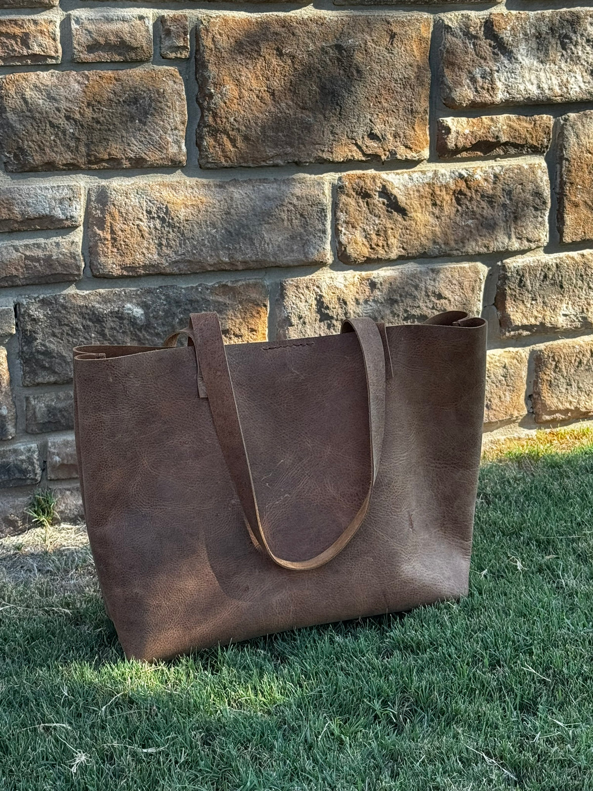 Rustic Brown Durable Buffalo Leather Tote with Magnetic Closure and Brass Feet