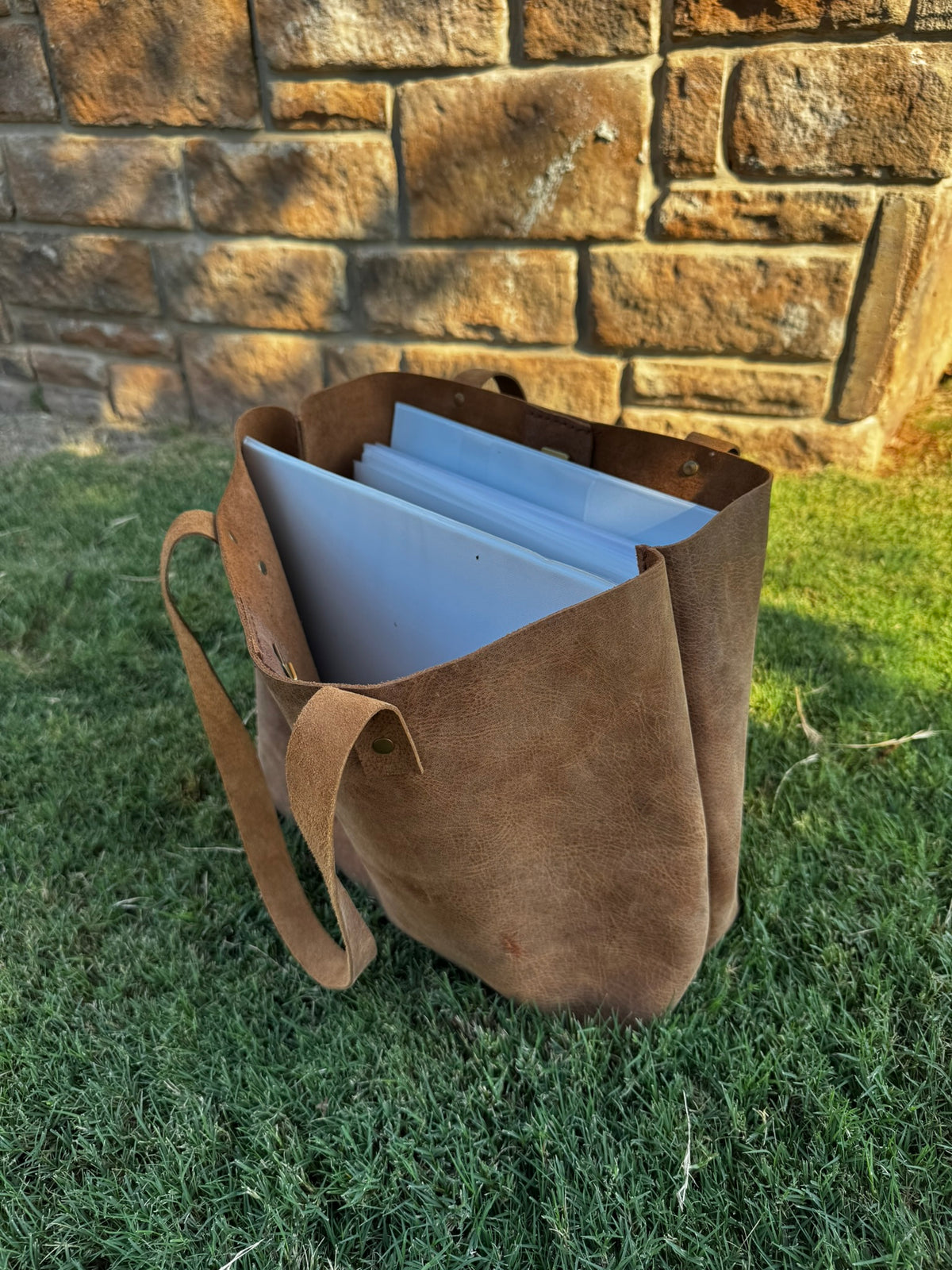 Rustic Brown Durable Buffalo Leather Tote with Magnetic Closure and Brass Feet
