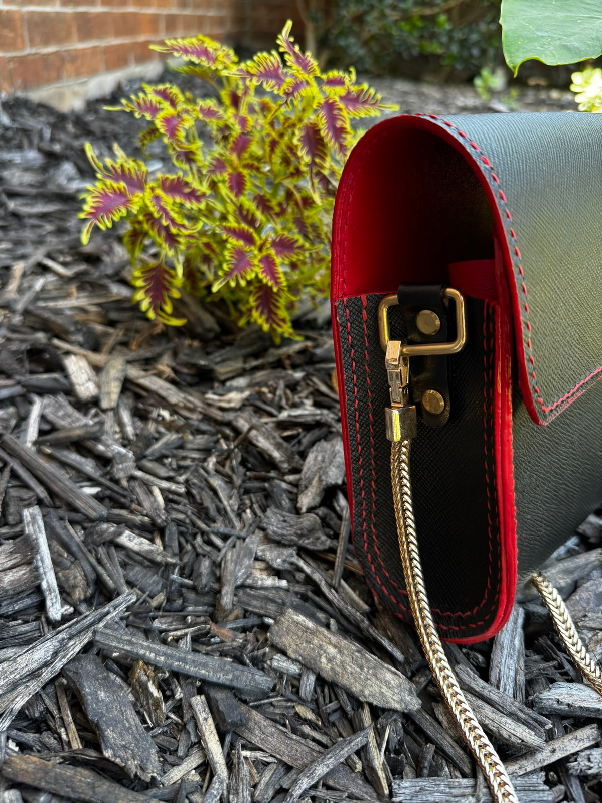 Designer Italian Black and Red Leather Purse with Gold Chain and Magnetic Closure