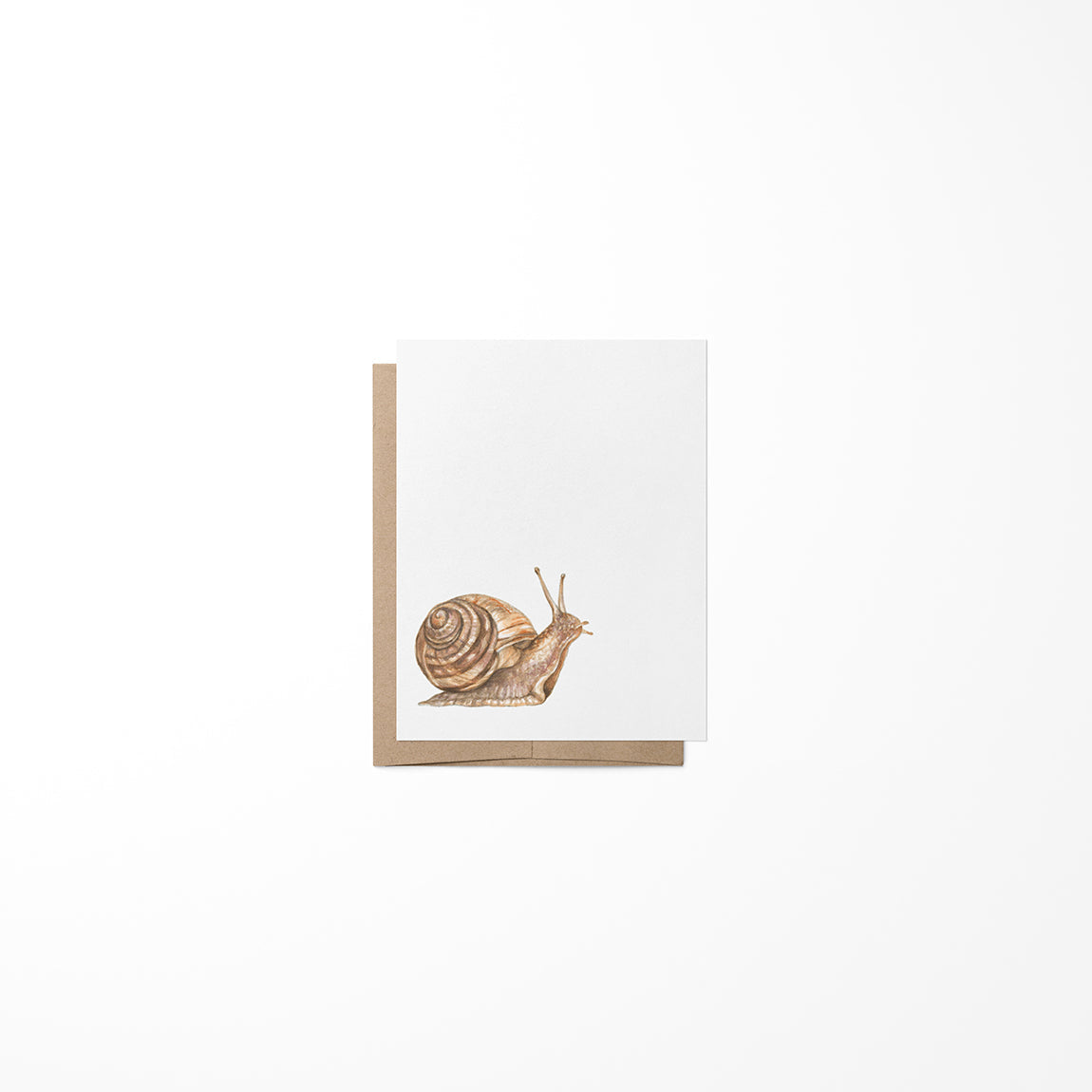 A greeting card with a snail illustration, made from heavy card stock paper with a kraft envelope.