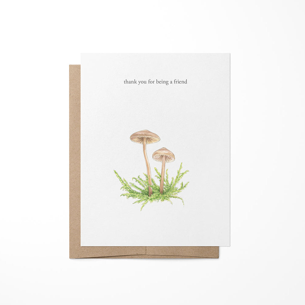 A greeting card with a mushroom illustration and the text &
