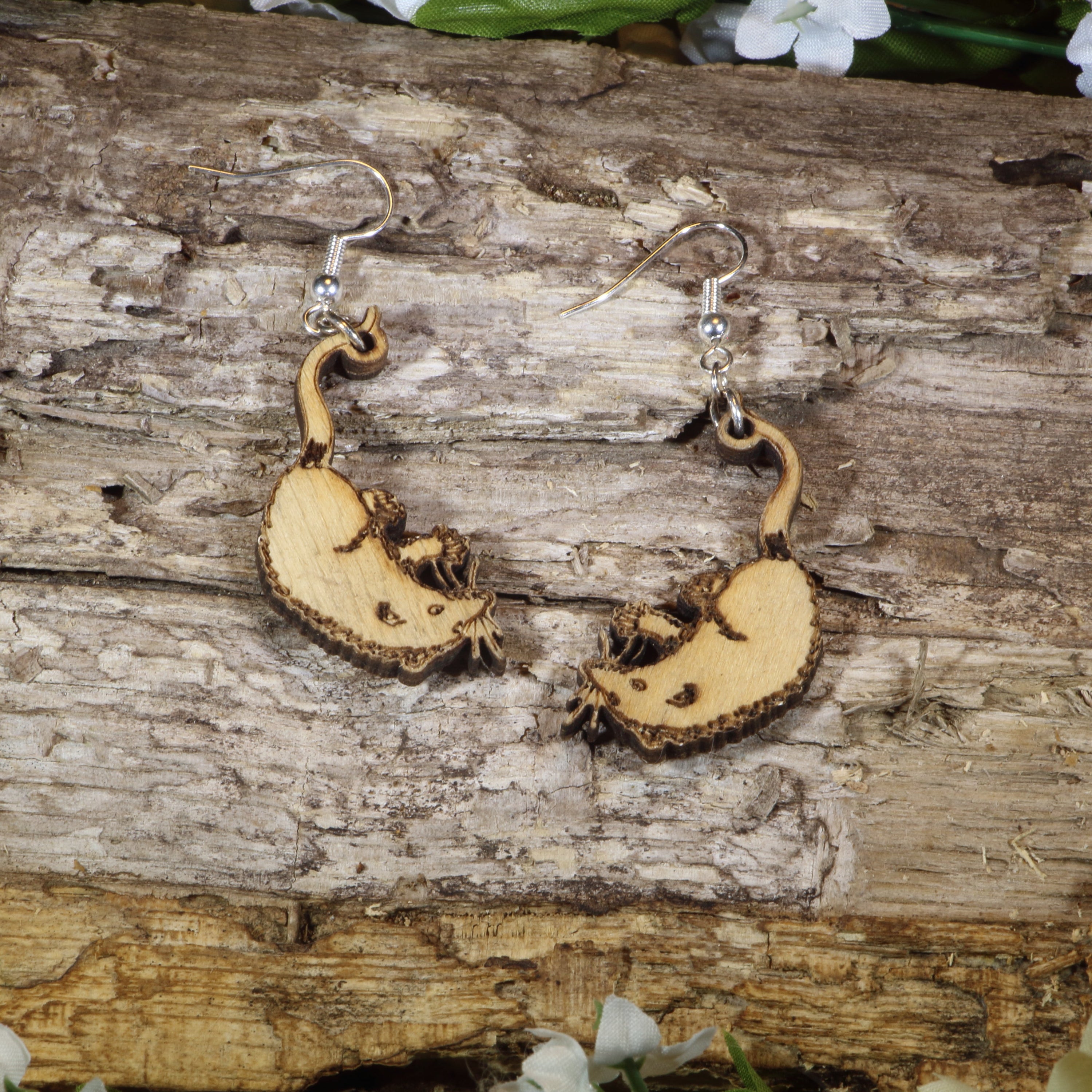 Hand-painted wooden opossum dangle earrings featuring adorable curled-tail opossum designs, hypoallergenic sterling silver hooks, and lightweight woodland animal jewelry for wildlife lovers, nature enthusiasts, and marsupial fans by Cate&