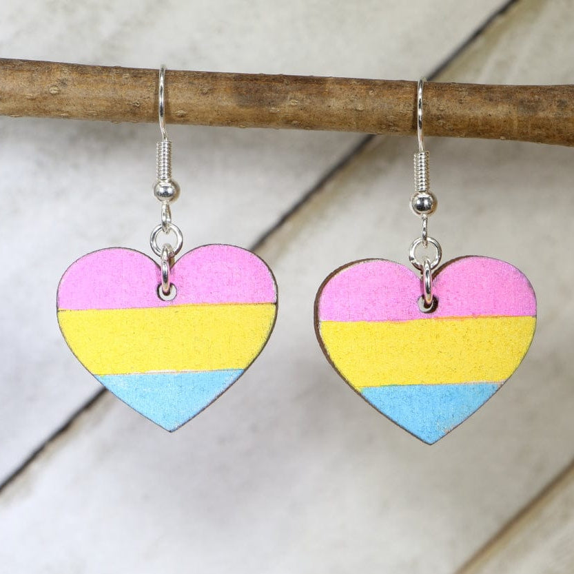 Hand-painted wooden pansexual heart dangle earrings with vibrant LGBTQ pride design and hypoallergenic sterling silver hooks, colorful equality statement jewelry for pride events and everyday expression