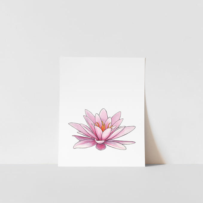A vertical art print of a pink lily flower with a white background, placed on a shelf.