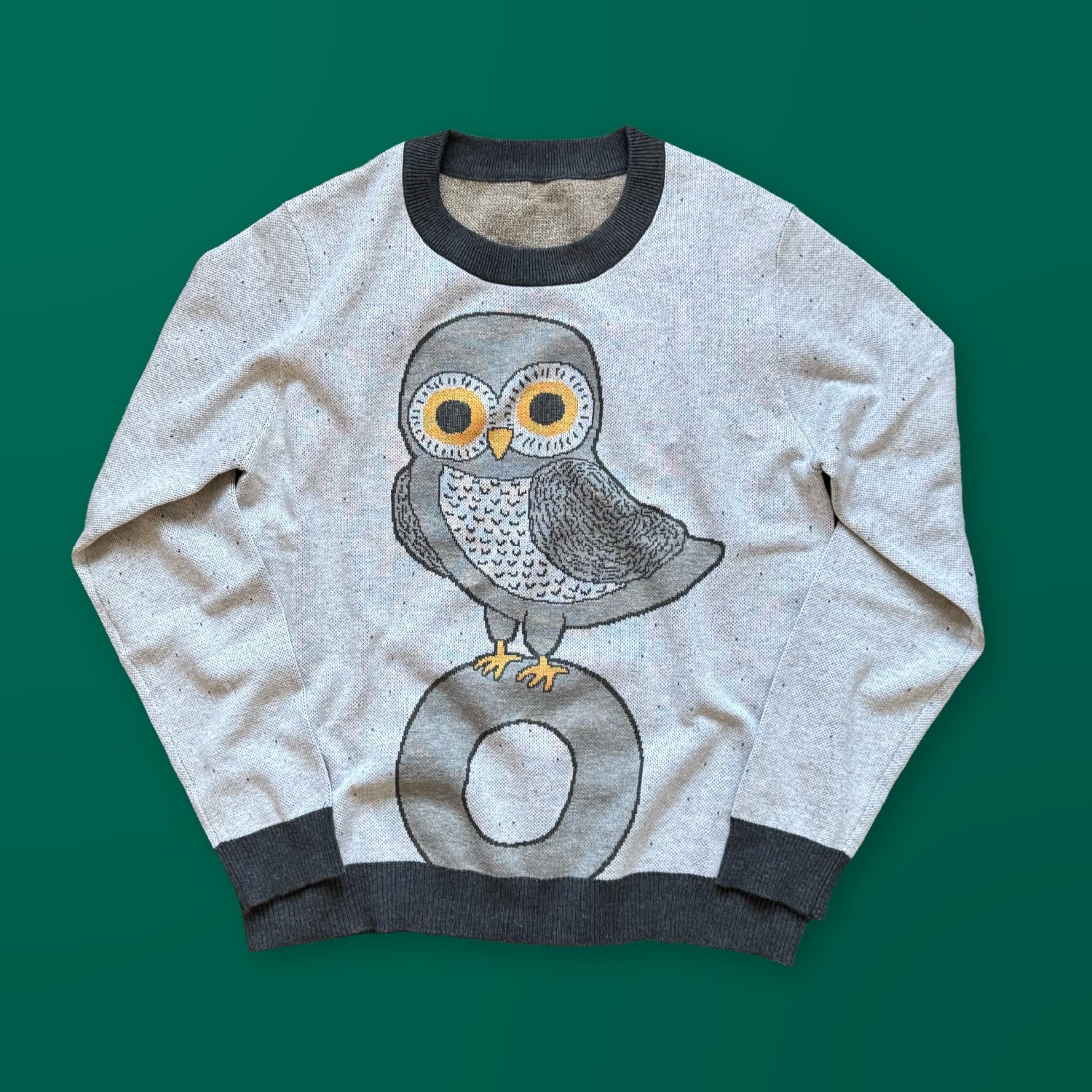 Owl on a Vowel graphic knit sweater in light gray — cute owl design knitted by artist Jedd