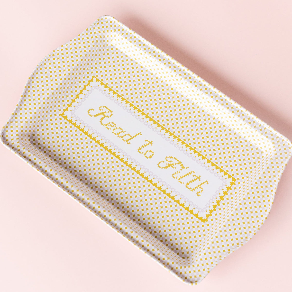 Read To Filth trinket tray styled with jewelry and bookish accessories on ceramic display, Jollity & Co.