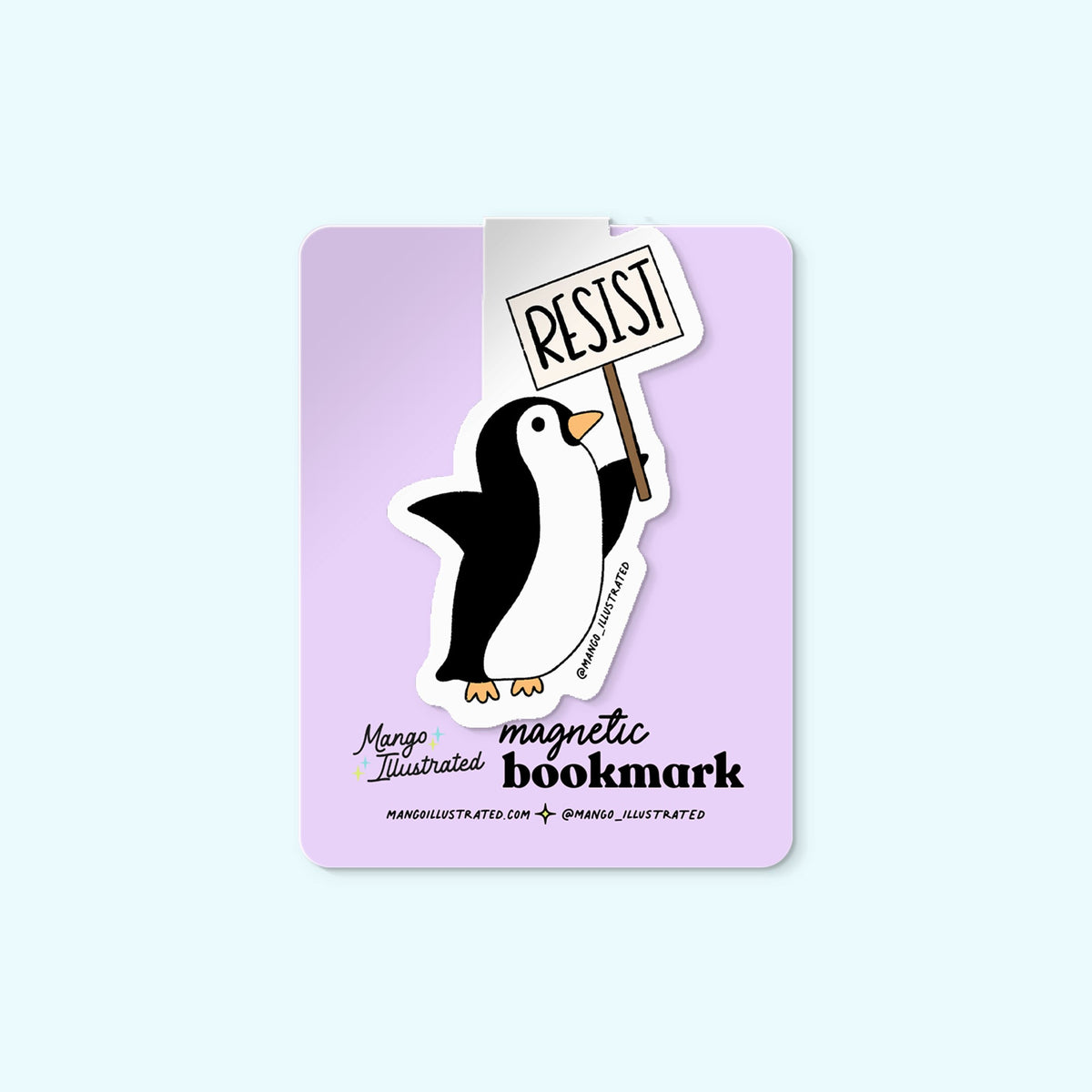 Protesting Penguin magnetic bookmark detail — illustrated protest penguin page marker on a book by indie artist MangoIllustrated